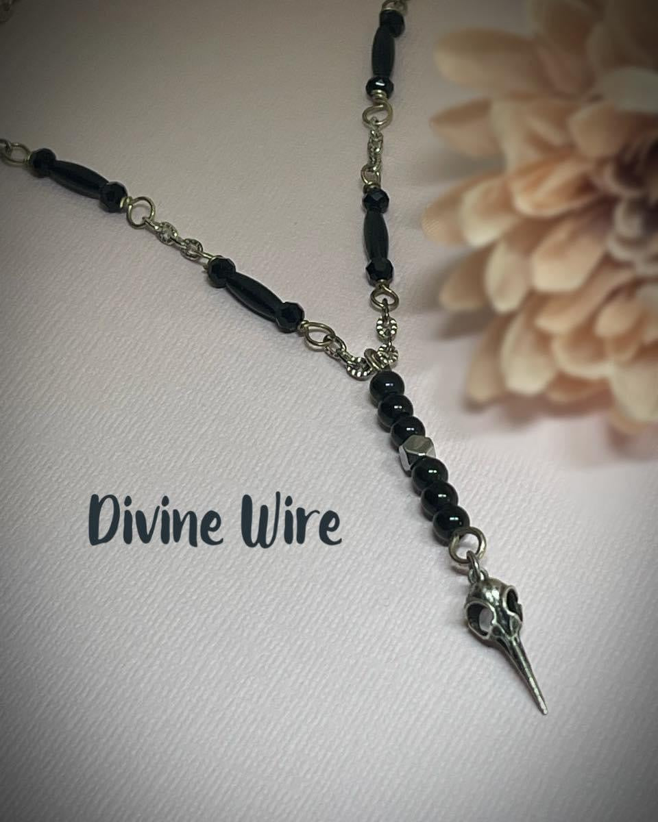 Sterling Silver Hummingbird Scull with Black Onyx Beads